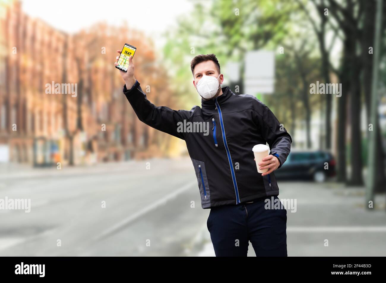Calling Taxi Cab Using Phone App. Hailing And Stopping Using Arm Stock Photo