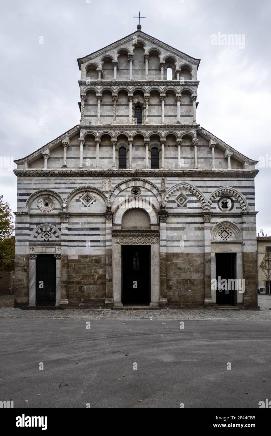 The facade of the old Roman Catholic church on a gloomy day in the city of  Pisa, Italy Stock Photo - Alamy