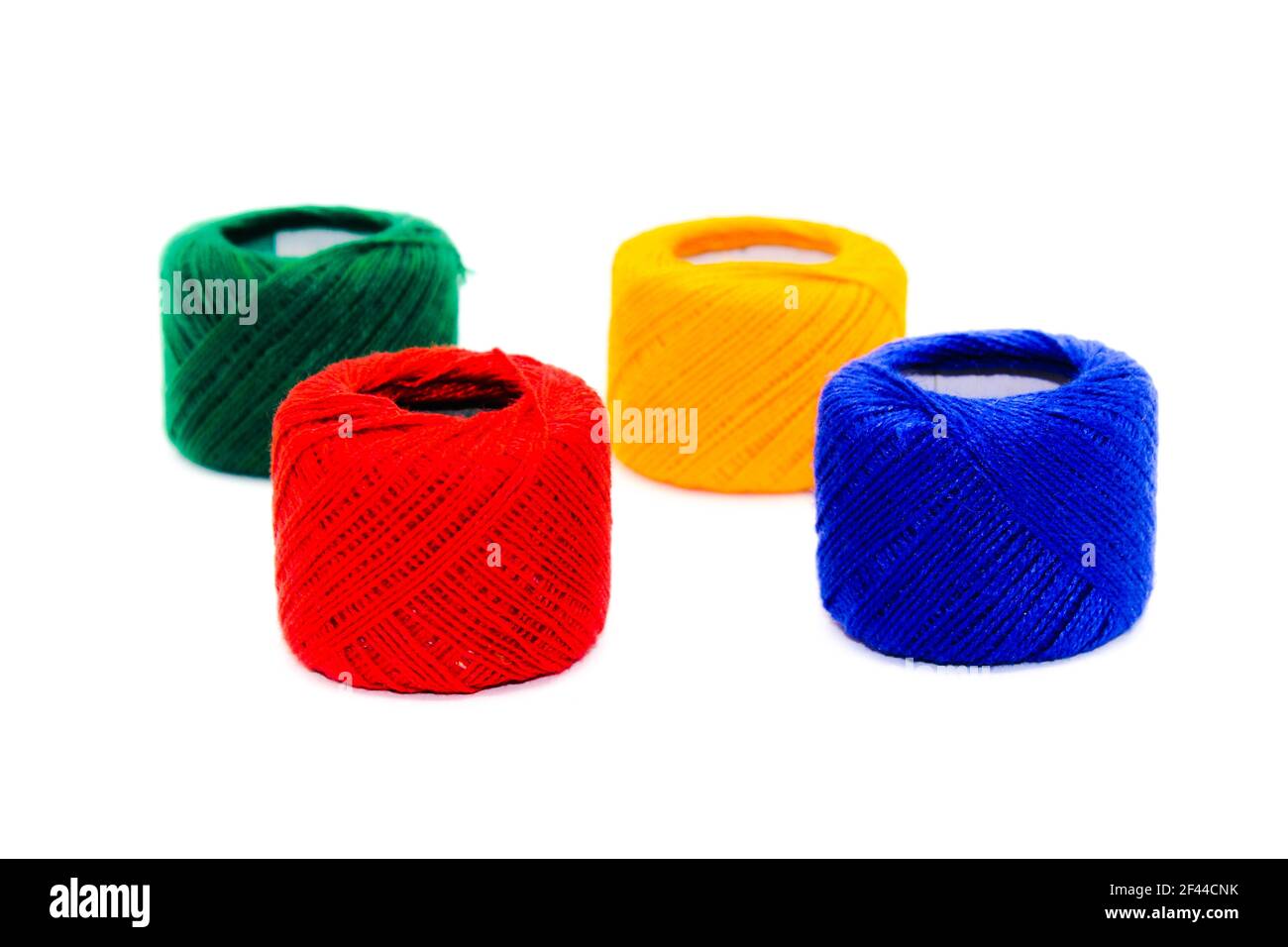 A picture of thread spools isolated on white background Stock Photo - Alamy