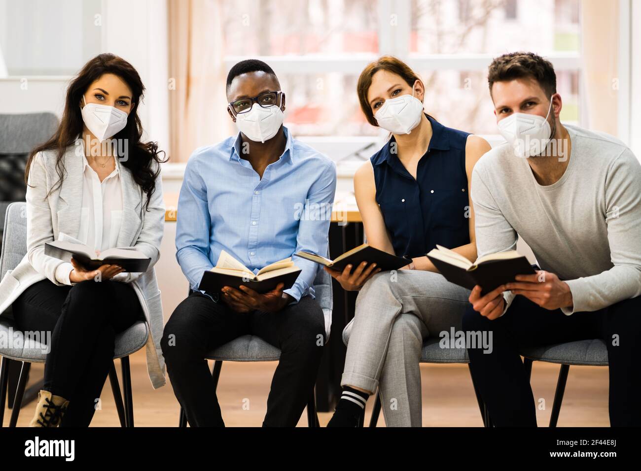 Group Bible Study And Discipleship. People Reading Stock Photo