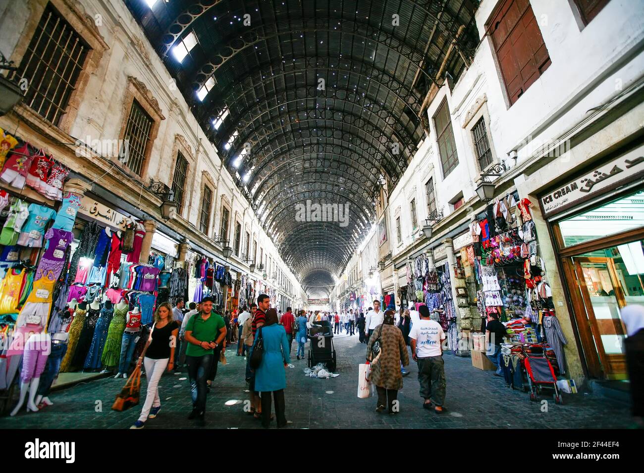 Pre-war Syria.People in Souq Al-Hamidiyah, the Old City's main souq.The number of Syrians who fled the Civil War grew to 4 million 185 thousand. Stock Photo