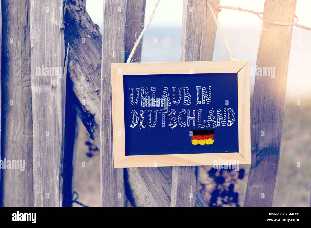 Beach, chalk board and slogan vacation in Germany Stock Photo