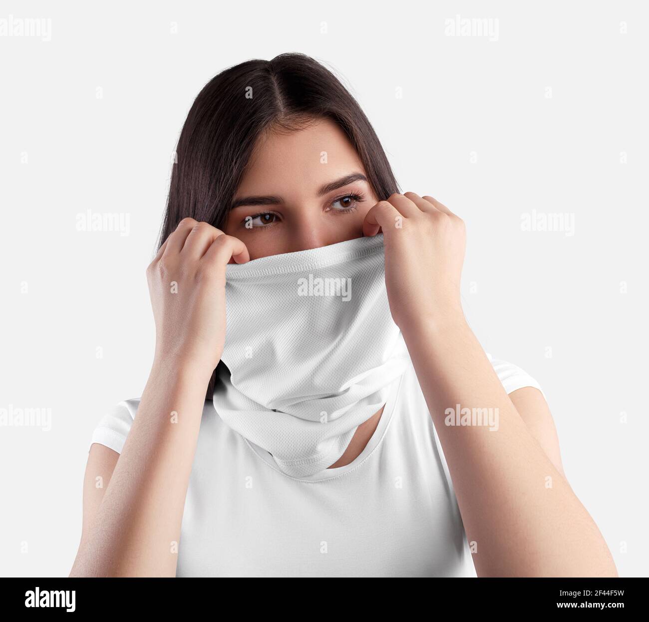 Mockup white texture buff on a young girl with dark hair straightening a blank half mask, for a design presentation. Cloth kerchief template covering Stock Photo