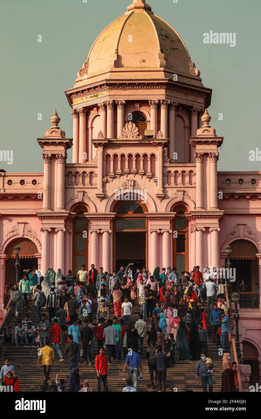 tourist's crowd on Ahsan Manzil Museum . Ahsan Manzil used to be the official residential palace and seat of the Nawab of Dhaka. full of people. Stock Photo
