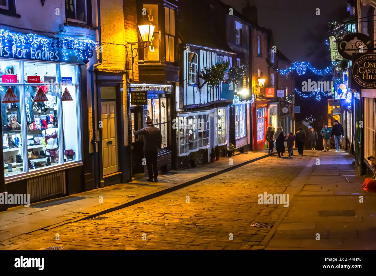 The City of Lincoln at night with shop light illumination Stock Photo