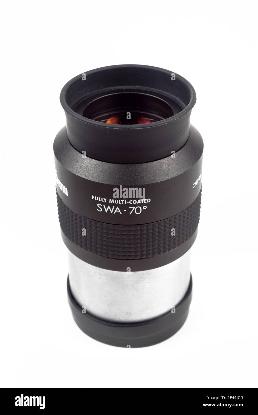 Telescope eyepiece on a white background, isolate, close-up. Stock Photo
