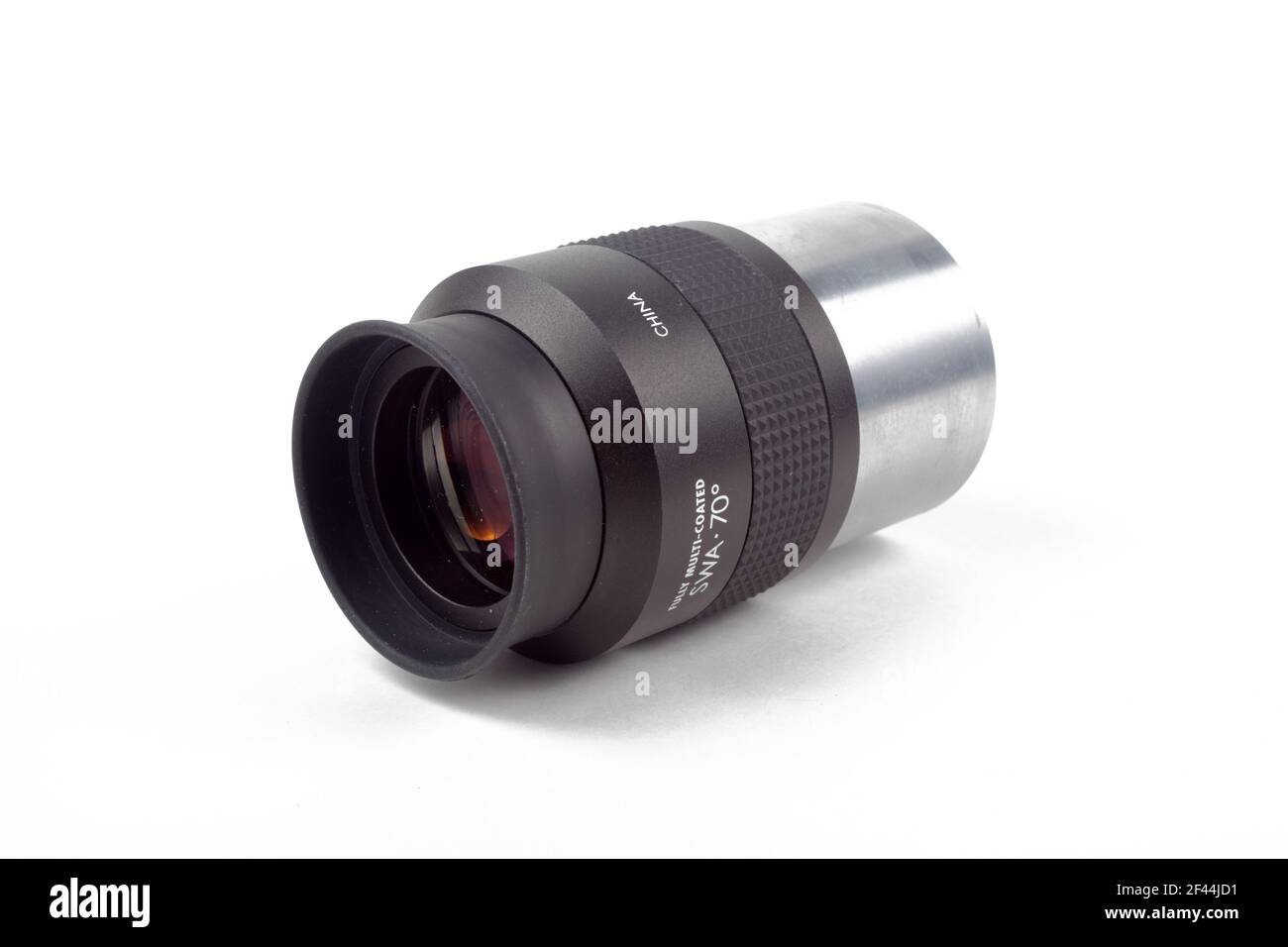 Telescope eyepiece on white background, isolate, close-up. Stock Photo