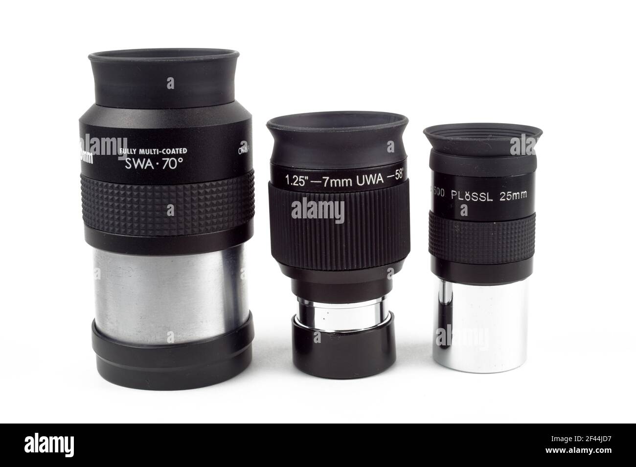 Telescope eyepieces on white background, isolate, close-up. Stock Photo