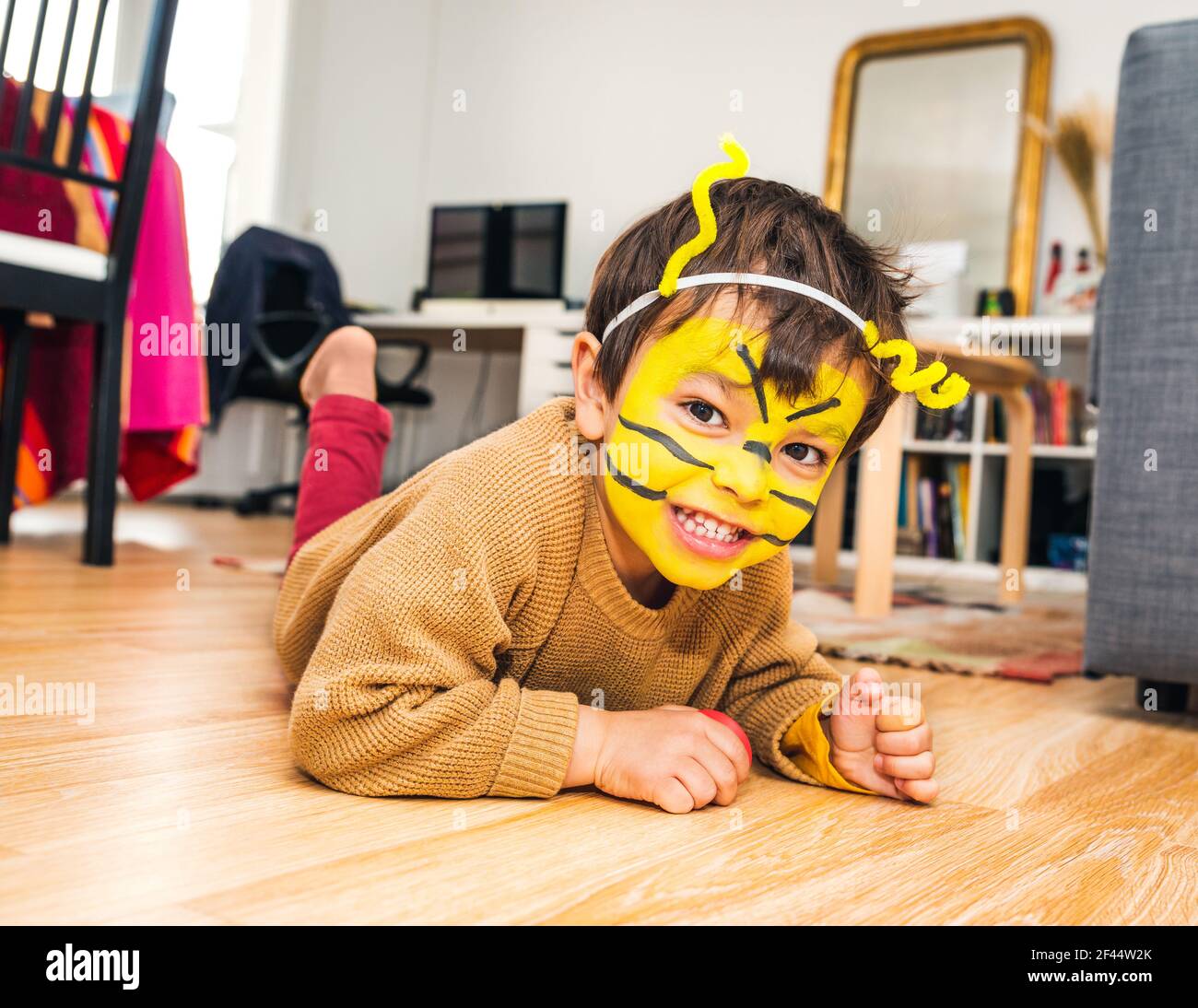 Little boy with bee face paint Stock Photo