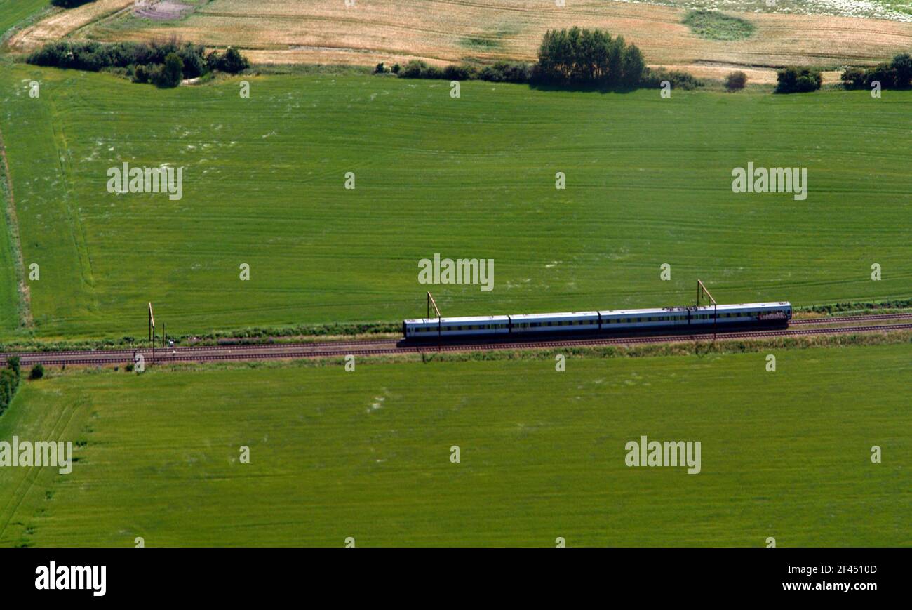 A diesel train engine on an electrified railroad Stock Photo Alamy