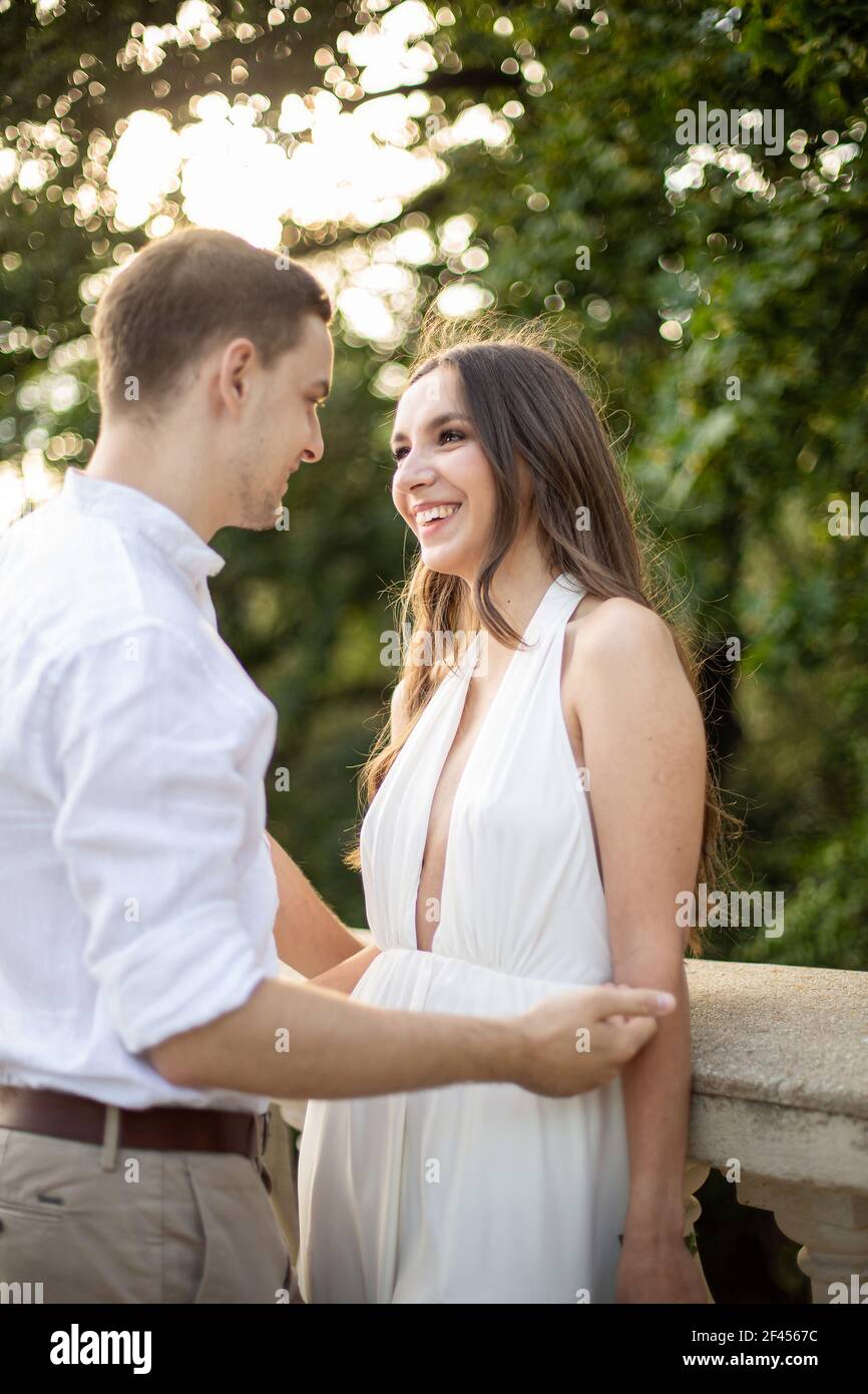 Young couple in white clothes hi-res stock photography and images - Alamy