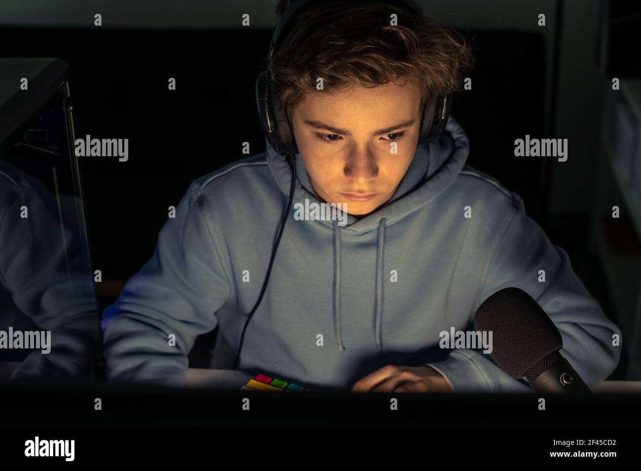 Video game streamers playing on their home console. Teenager playing