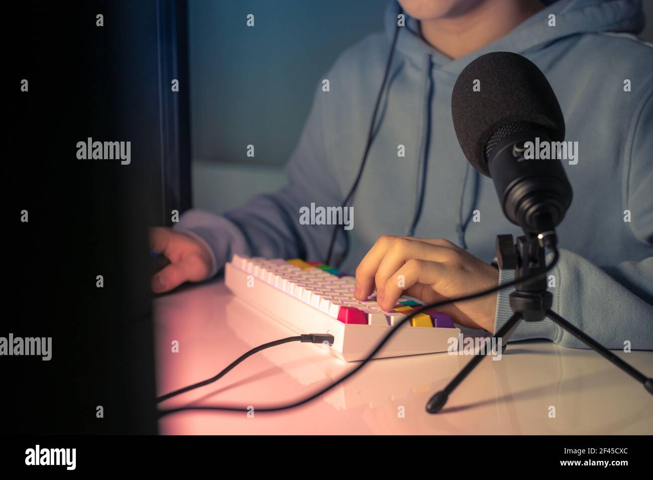 Video game streamers playing on their home console. Teenager playing