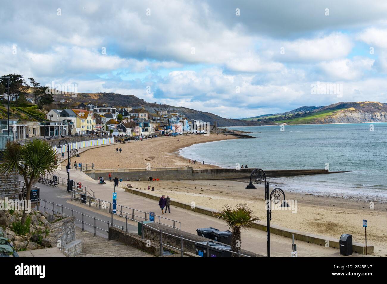 Lyme Regis, Dorset, UK. 19th Mar, 2021. UK Weather: A mixed bag of sunshine and cloud along with a chilly breeze at the seaside resort of Lyme Regis. A bracing sea breeze kept people away as unsettled conditions are forecast over the weekend Credit: Celia McMahon/Alamy Live News Stock Photo