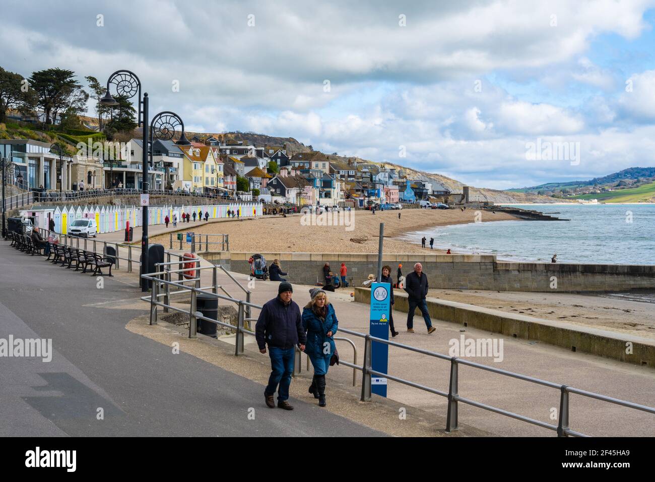 Lyme Regis, Dorset, UK. 19th Mar, 2021. UK Weather: A mixed bag of sunshine and cloud along with a chilly breeze at the seaside resort of Lyme Regis. A bracing sea breeze kept people away as unsettled conditions are forecast over the weekend Credit: Celia McMahon/Alamy Live News Stock Photo