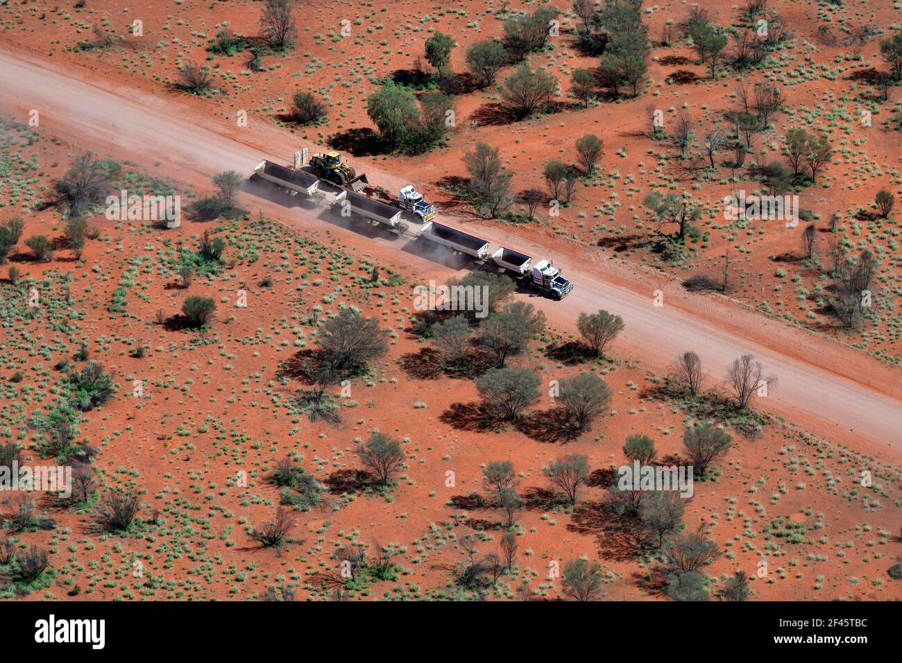 Australia, NT,  trucks with trailers on unsealed Maryvale road in outback area, Stock Photo