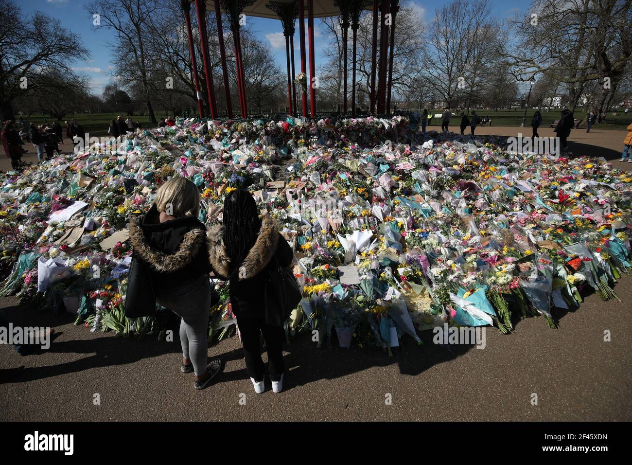 Floral tributes at the bandstand in Clapham Common, London, for Sarah Everard. Pc Wayne Couzens, 48, appeared at the Old Bailey in London charged with the kidnap and murder of the 33-year-old. Picture date: Friday March 19, 2021. Stock Photo