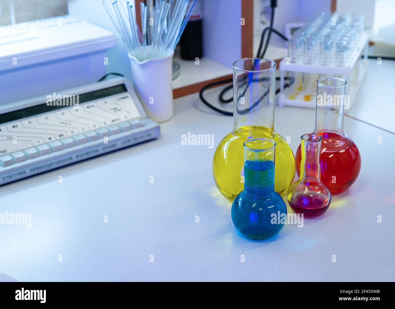 colorful test tubes and flasks in the laboratory Stock Photo - Alamy