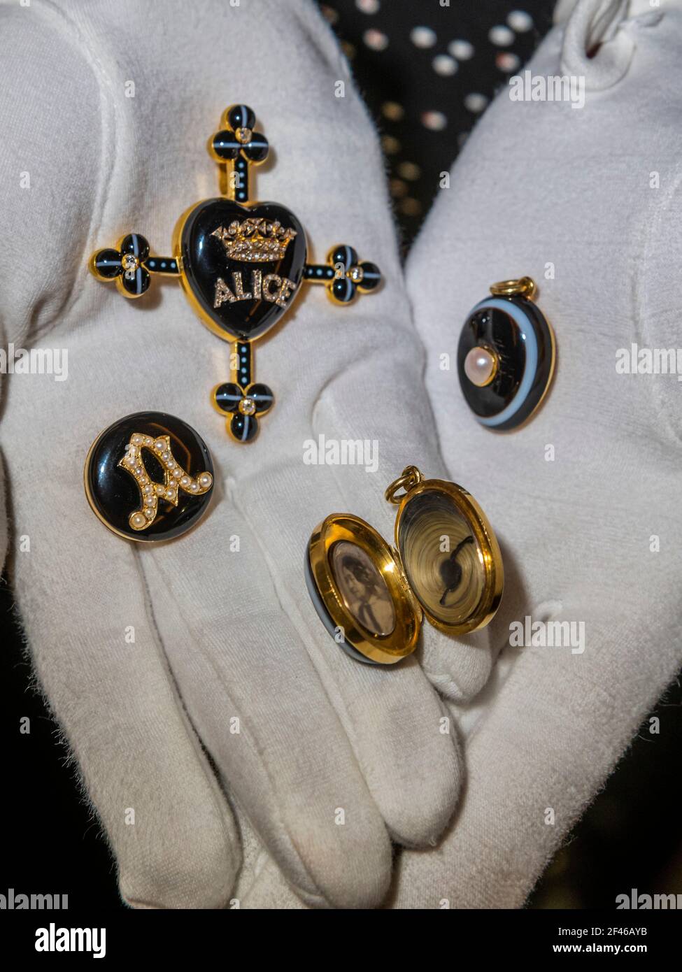 London, UK. 19th Mar, 2021. Queen Victoria's Mourning Jewellery including a diamond cross centring on an onyx heart commemorating Princess Alice, Queen Victoria's third child, who died of diphtheria at the age of 35 (est. £2,000-3,000) - Sotheby's preview of The Family Collection of Patricia Knatchbull, 2nd Countess Mountbatten of Burma, including Mourning Jewels Belonging to her Great-Great-Grandmother Queen Victoria and pieces Connected to her Father Lord Mountbatten at the New Bond Street Galleries. Credit: Guy Bell/Alamy Live News Stock Photo