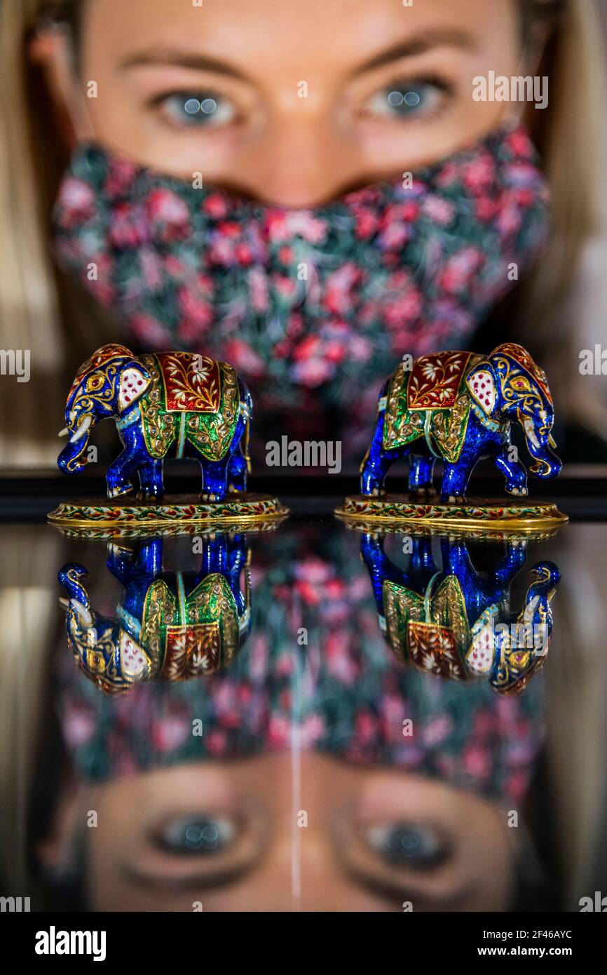 London, UK. 19th Mar, 2021. A pair of jewelled and enamelled gold elephants, India, Jaipur, mid-20th century, Estimate: £2,000-3,000 - Sotheby's preview of The Family Collection of Patricia Knatchbull, 2nd Countess Mountbatten of Burma, including Mourning Jewels Belonging to her Great-Great-Grandmother Queen Victoria and pieces Connected to her Father Lord Mountbatten at the New Bond Street Galleries. Credit: Guy Bell/Alamy Live News Stock Photo