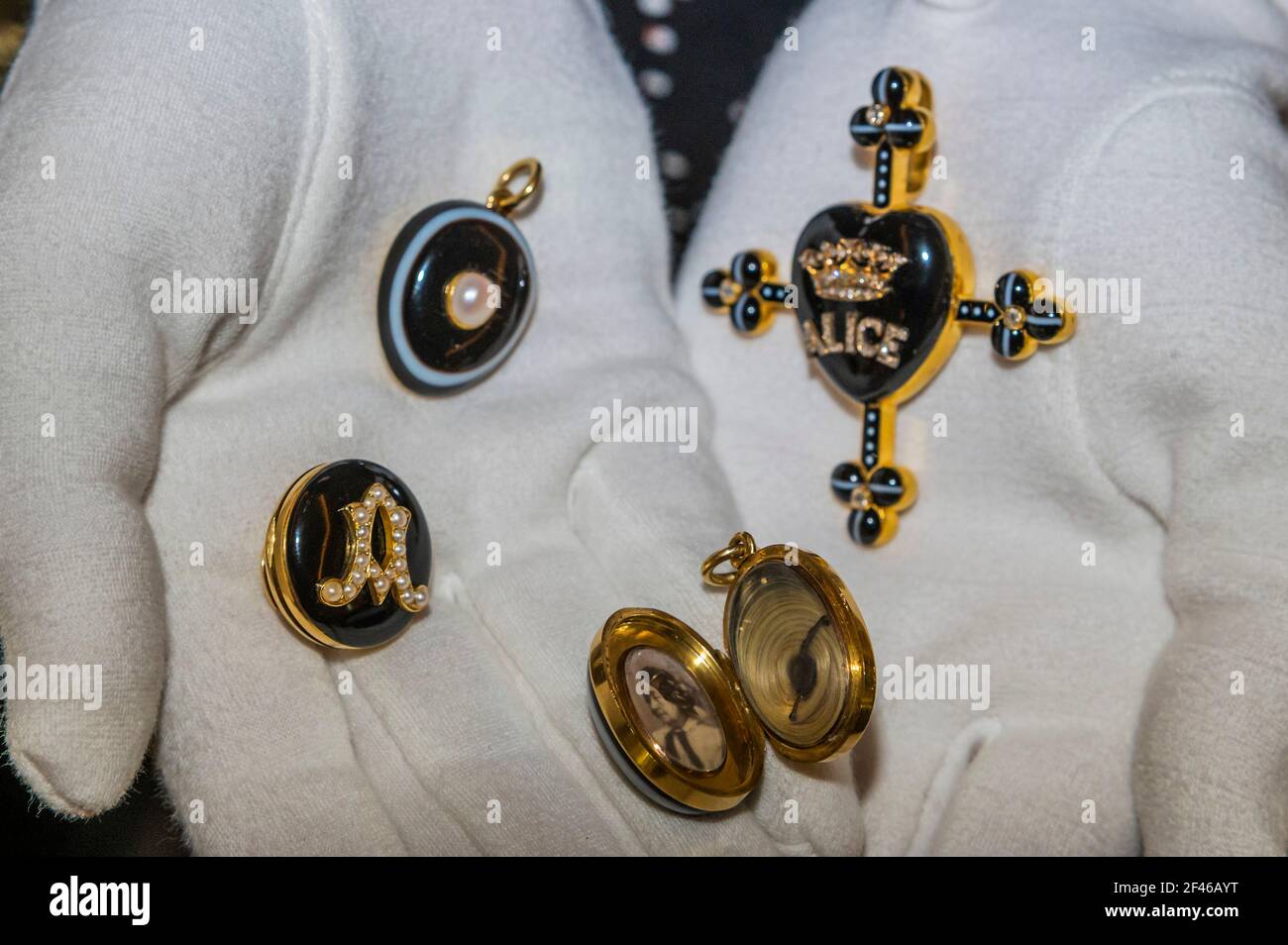 London, UK. 19th Mar, 2021. Queen Victoria's Mourning Jewellery including a diamond cross centring on an onyx heart commemorating Princess Alice, Queen Victoria's third child, who died of diphtheria at the age of 35 (est. £2,000-3,000) - Sotheby's preview of The Family Collection of Patricia Knatchbull, 2nd Countess Mountbatten of Burma, including Mourning Jewels Belonging to her Great-Great-Grandmother Queen Victoria and pieces Connected to her Father Lord Mountbatten at the New Bond Street Galleries. Credit: Guy Bell/Alamy Live News Stock Photo