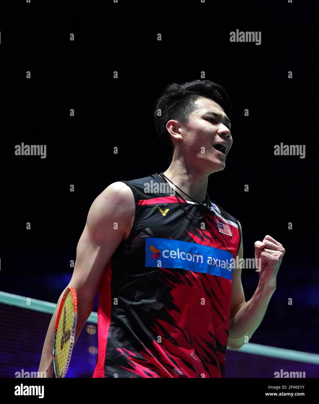 Malaysias Lee Zii Jia celebrates during his match against Japans Kento Momota on day three of