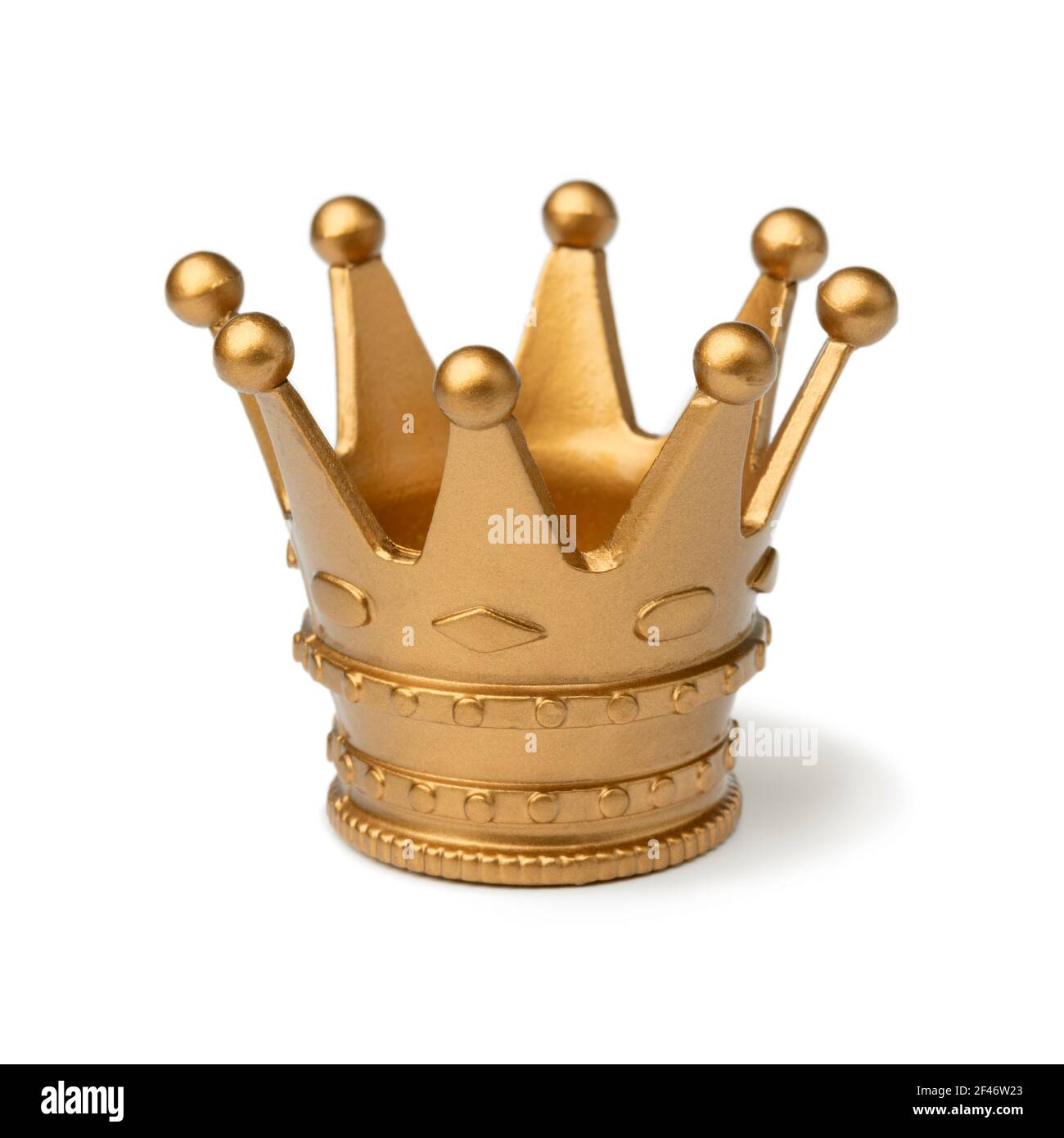 Single small golden toy crown isolated on white background Stock Photo