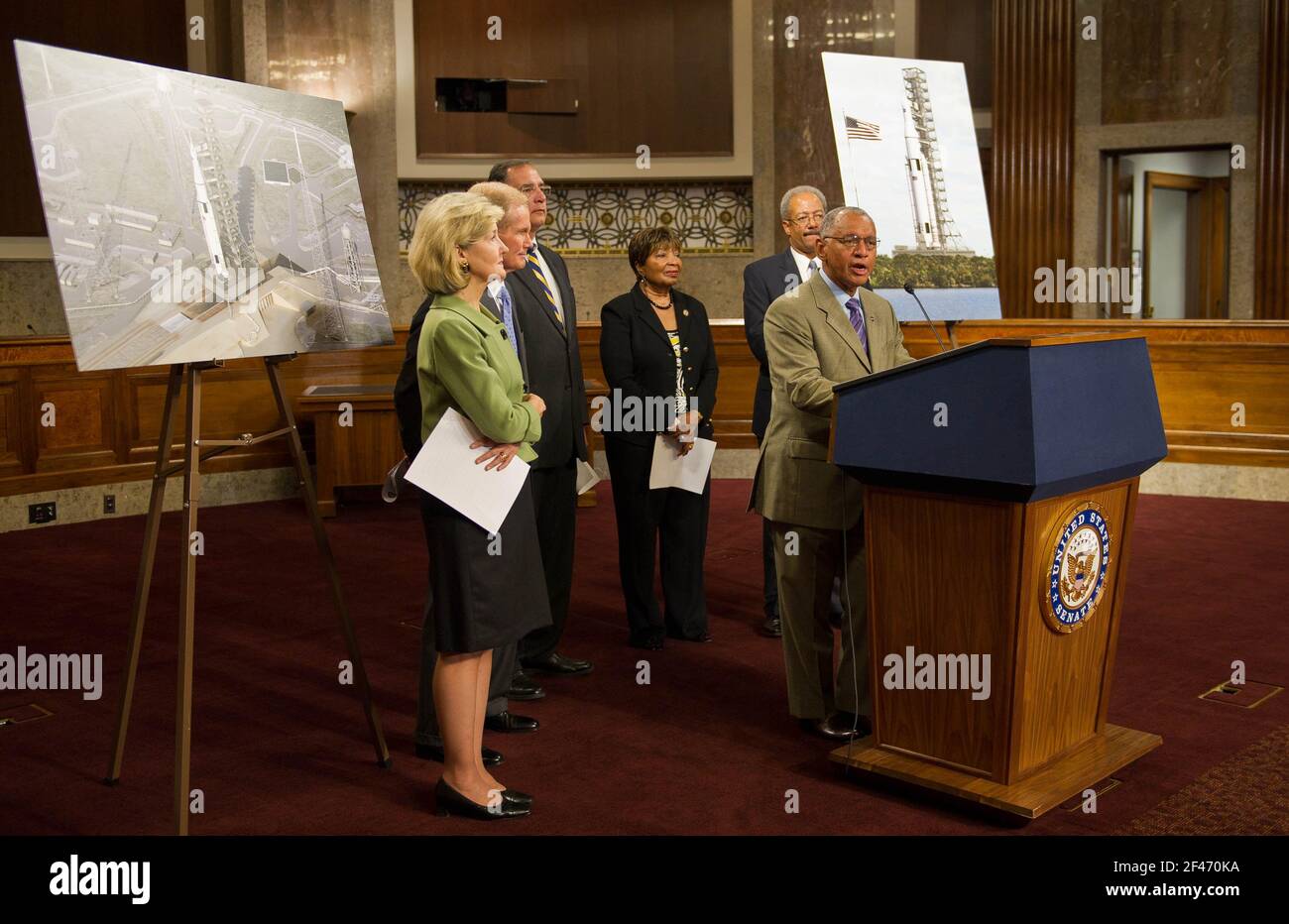 NASA Administrator Charles Bolden, at podium, is flanked by United States Senators Kay Bailey Hutchison (Republican of Texas); Bill Nelson (Democrat of Florida); John Boozeman (Republican of Arkansas); U.S. Representatives Eddie Bernice Johnson (Democrat of Texas) and Chaka Fattah (Democrat of Pennsylvania) as he speaks about the design of a new Space Launch System during a press conference, Wednesday, September 14, 2011, at the Dirksen Senate Office Building on Capitol Hill in Washington. The new system will take the agency's astronauts farther into space than ever before, create high-quality Stock Photo