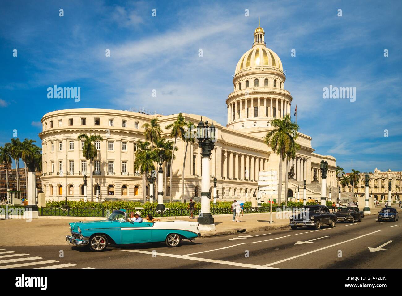 October 28, 2019: vintage car and National Capitol Building, a public edifice and one of the most visited sites  in havana, cuba. It was built from 19 Stock Photo