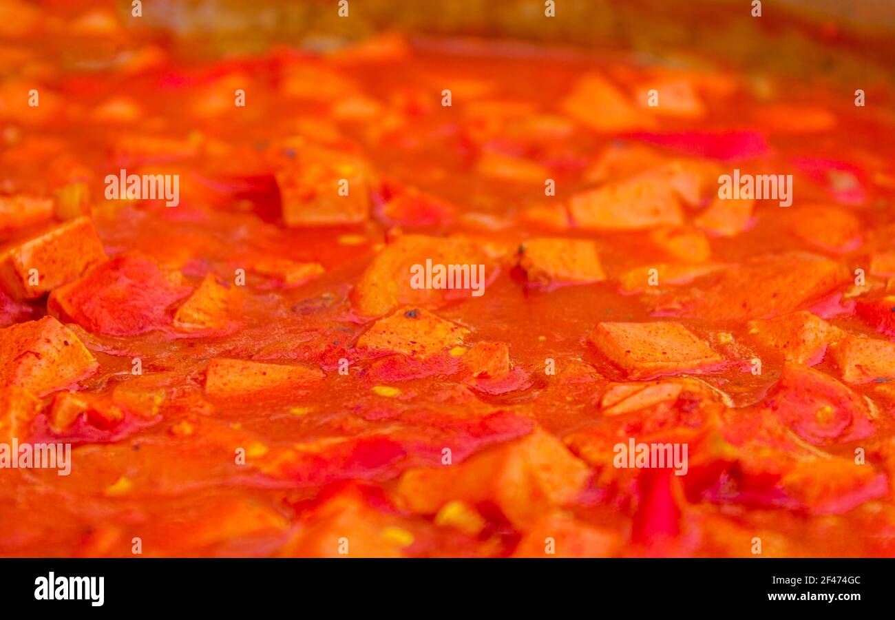 Sliced sausages cooked in tomato sauce for spaghetti Croatia Stock