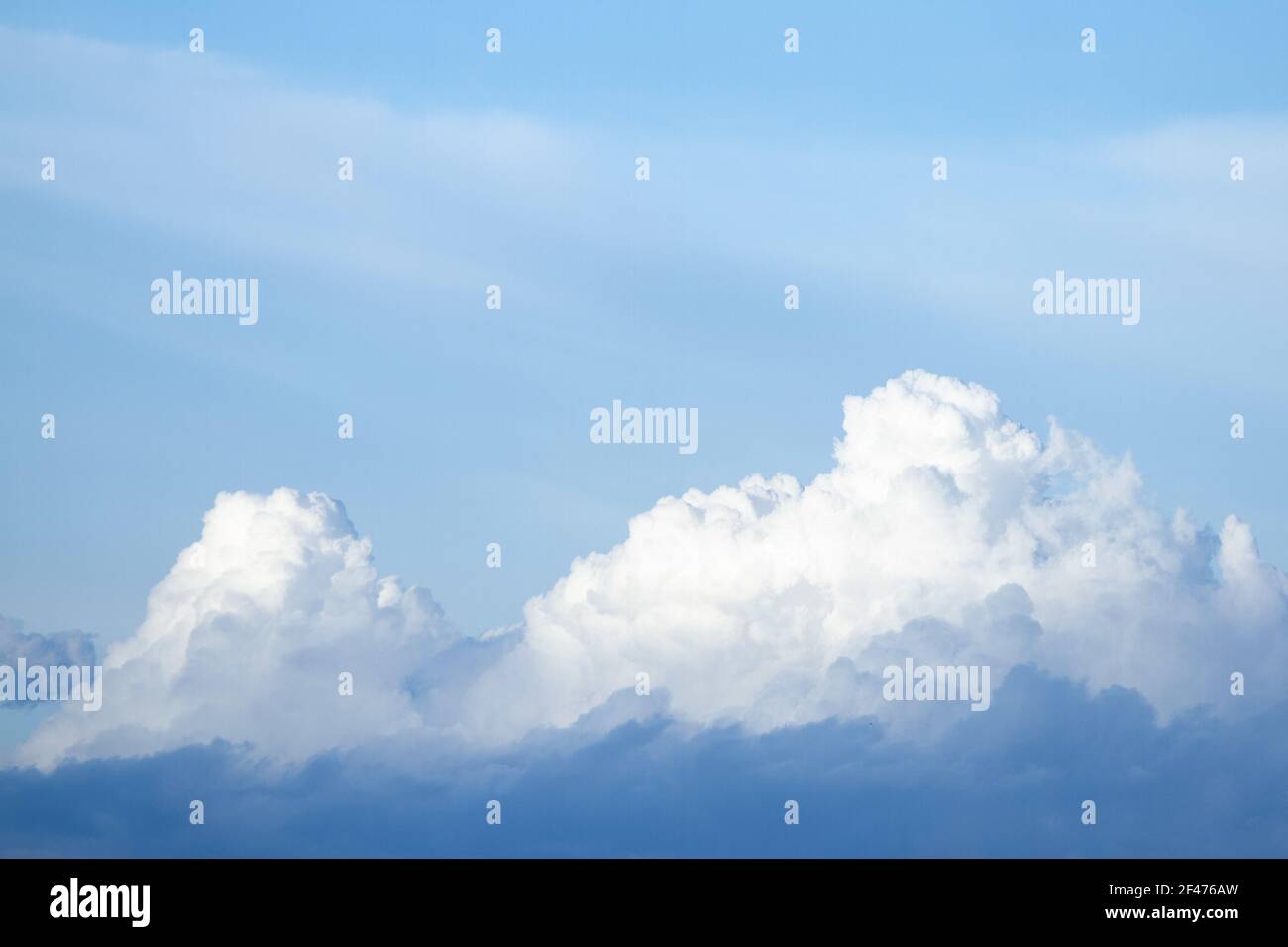 A beautiful cloudscape with fluffy clouds and blue sky Stock Photo - Alamy