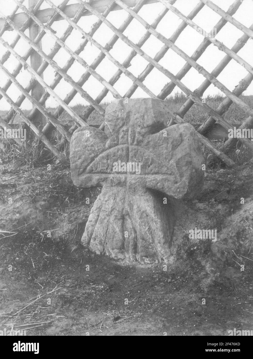 Stone cross with crossbow Stock Photo Alamy