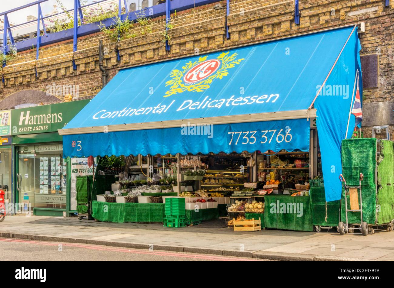 AC Continental Delicatessen in a railway arch at Atlantic Road, Brixton. Stock Photo