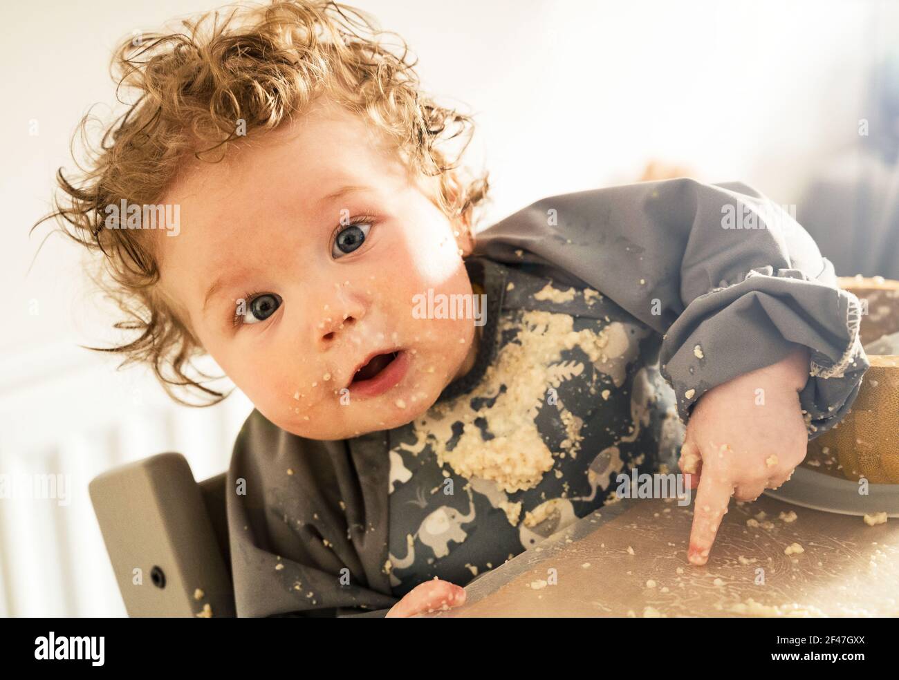 Young Baby Weaning Stock Photo
