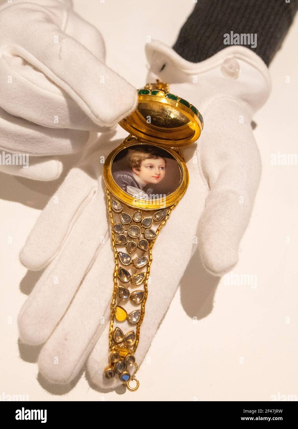 Sotheby’s, London, UK. 19 March 2021. The Family Collection of The Late Countess Mountbatten of Burma, great-great-granddaughter of Queen Victoria, will be offered at Sotheby’s London on 24 March and includes jewellery, furniture, paintings, sculpture, books, silver, ceramics & objets d’Art. Image: A Diamond-set and enamelled gold bracelet containing a miniature portrait of Albert, Prince Consort, as a child, By Henry Pierce Bone (177901855), India and England, 19th century, estimate £4,000-6,000. Credit: Malcolm Park/Alamy Live News. Stock Photo