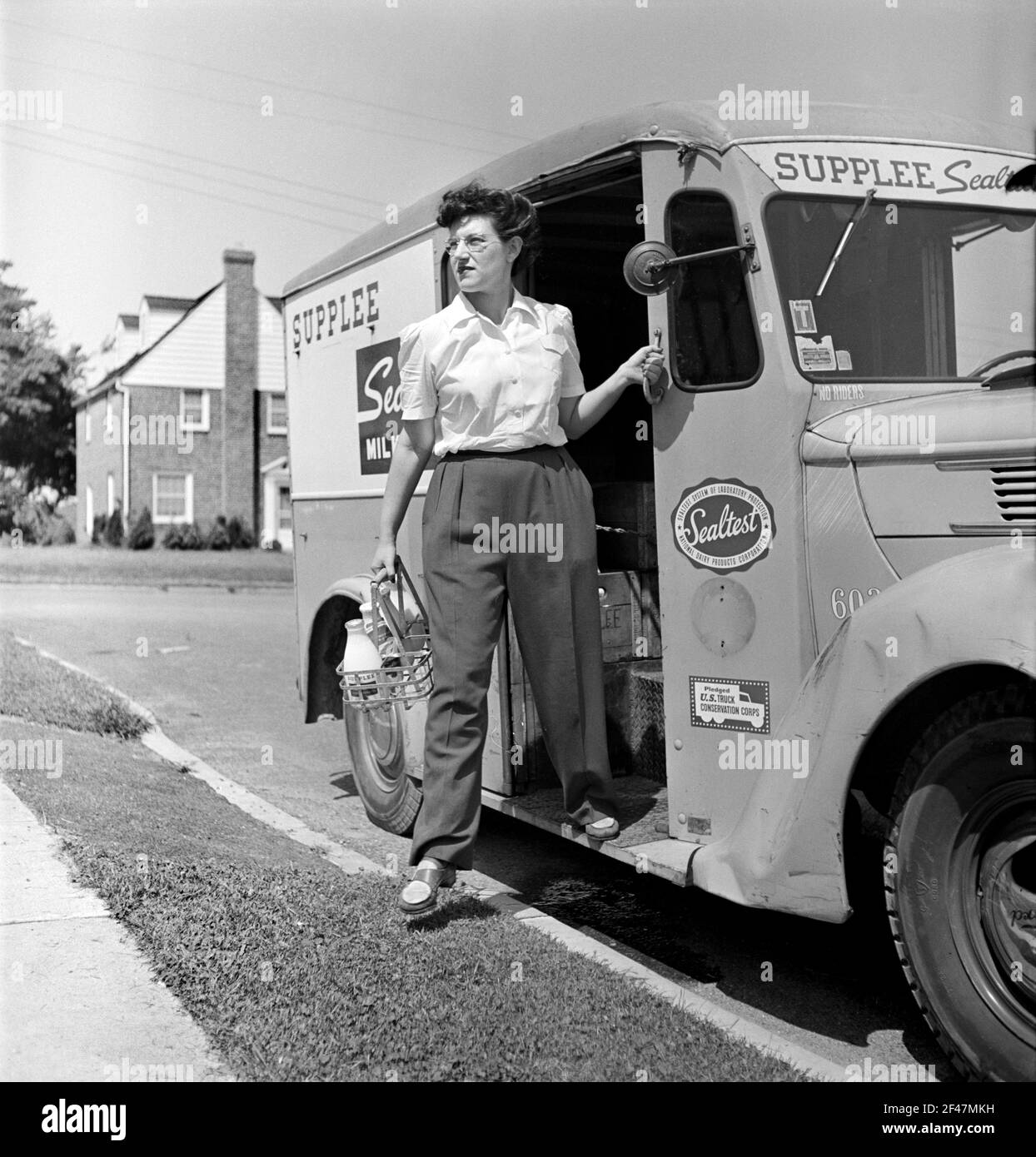 Miss Pearl Gold, one of the many women now working for the Supplee-Wills-Jones Milk Company, Bryn Mawr, Pennsylvania, USA, Jack Delano, U.S. Office of War Information, June 1943 Stock Photo