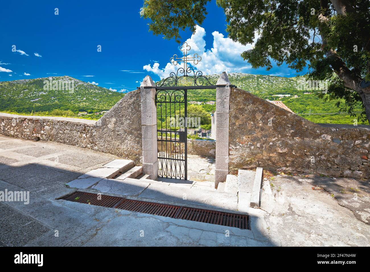 Graveyard gate from 1885 AD in historic town of Bribir in Vinodol valley, Kvarner region of Croatia Stock Photo