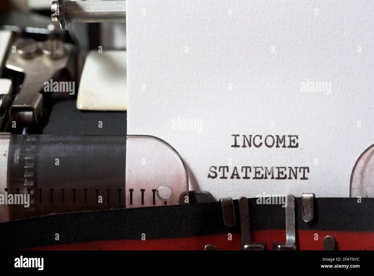 Typewriter Statement Income statement phrase written with a typewriter Stock Photo - Alamy
