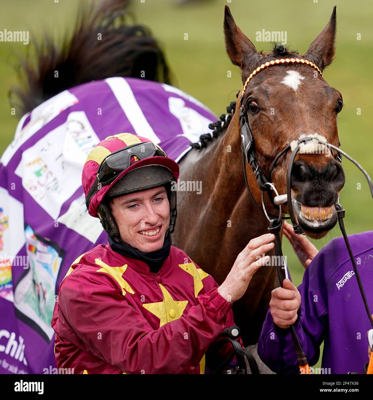 Jack Kennedy celebrates with Minella Indo after winning the WellChild Cheltenham Gold Cup Chase during day four of the Cheltenham Festival at Cheltenham Racecourse. Picture date: Friday March 19, 2021. Stock Photo