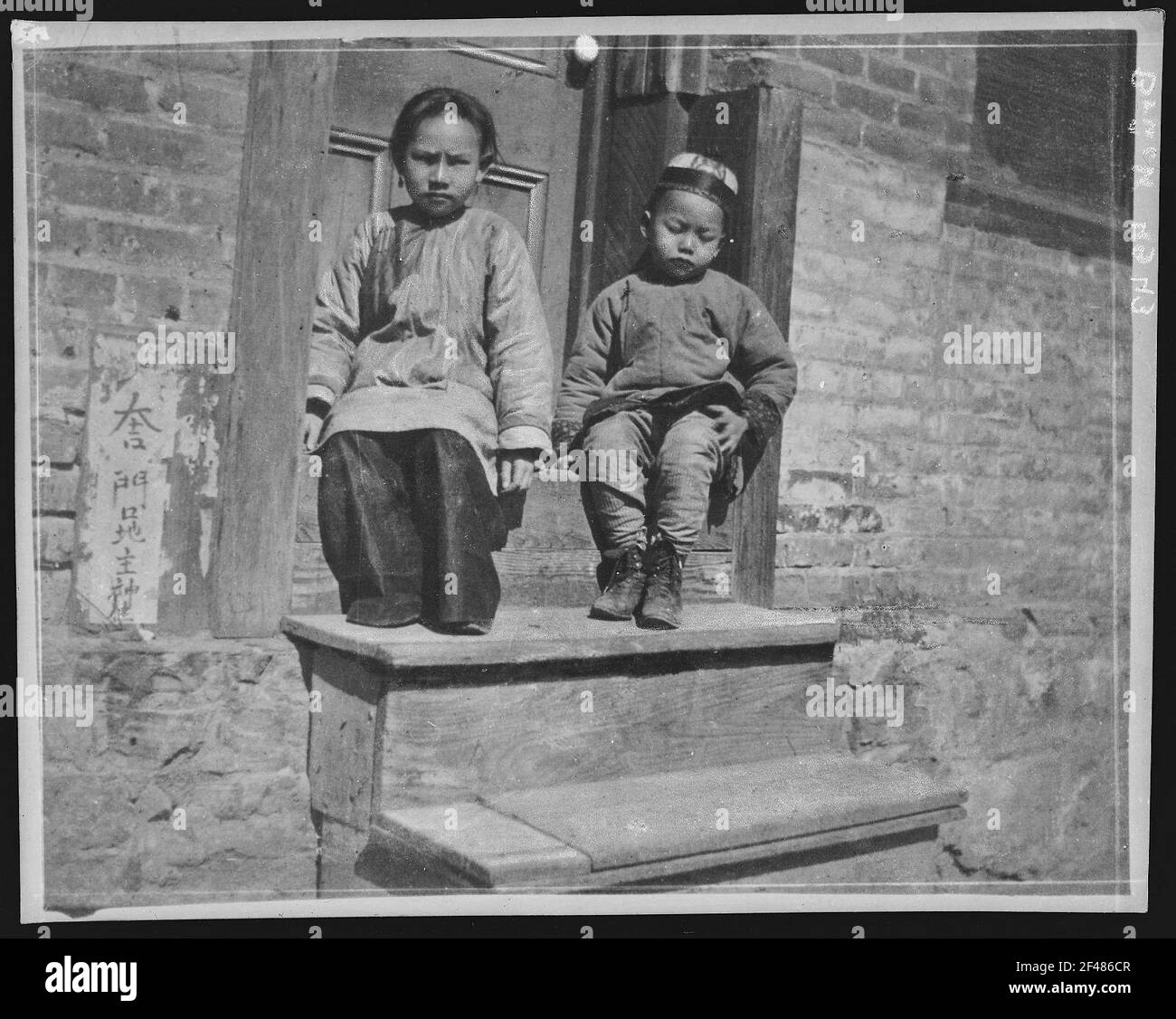 Two asian children Black and White Stock Photos & Images - Alamy