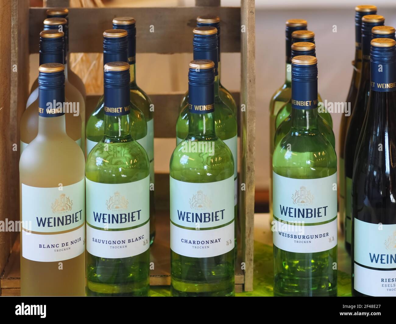 Bottles of expensive white wine in a row Stock Photo Alamy