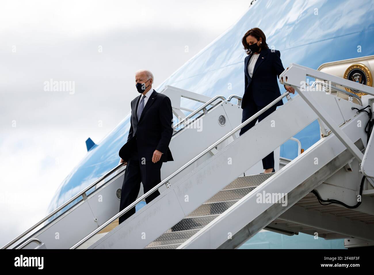 U.S. President Joe Biden and Vice President Kamala Harris disembark from Air  Force One to travel to the Centers for Disease Control in Atlanta, after  they arrived at Dobbins Air Reserve Base