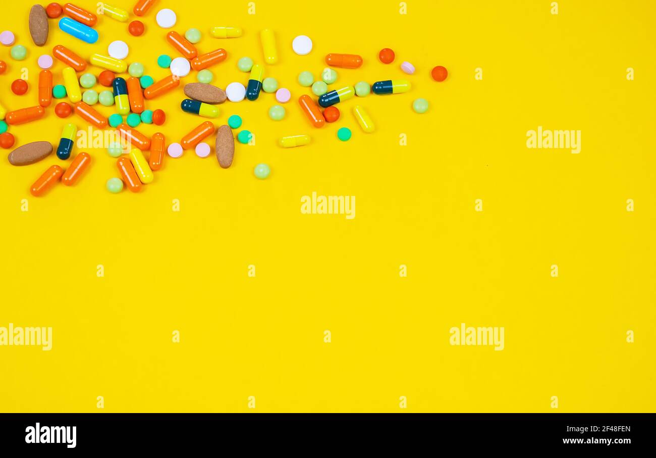 model airplane with multicolored pills from motion sickness closeup on