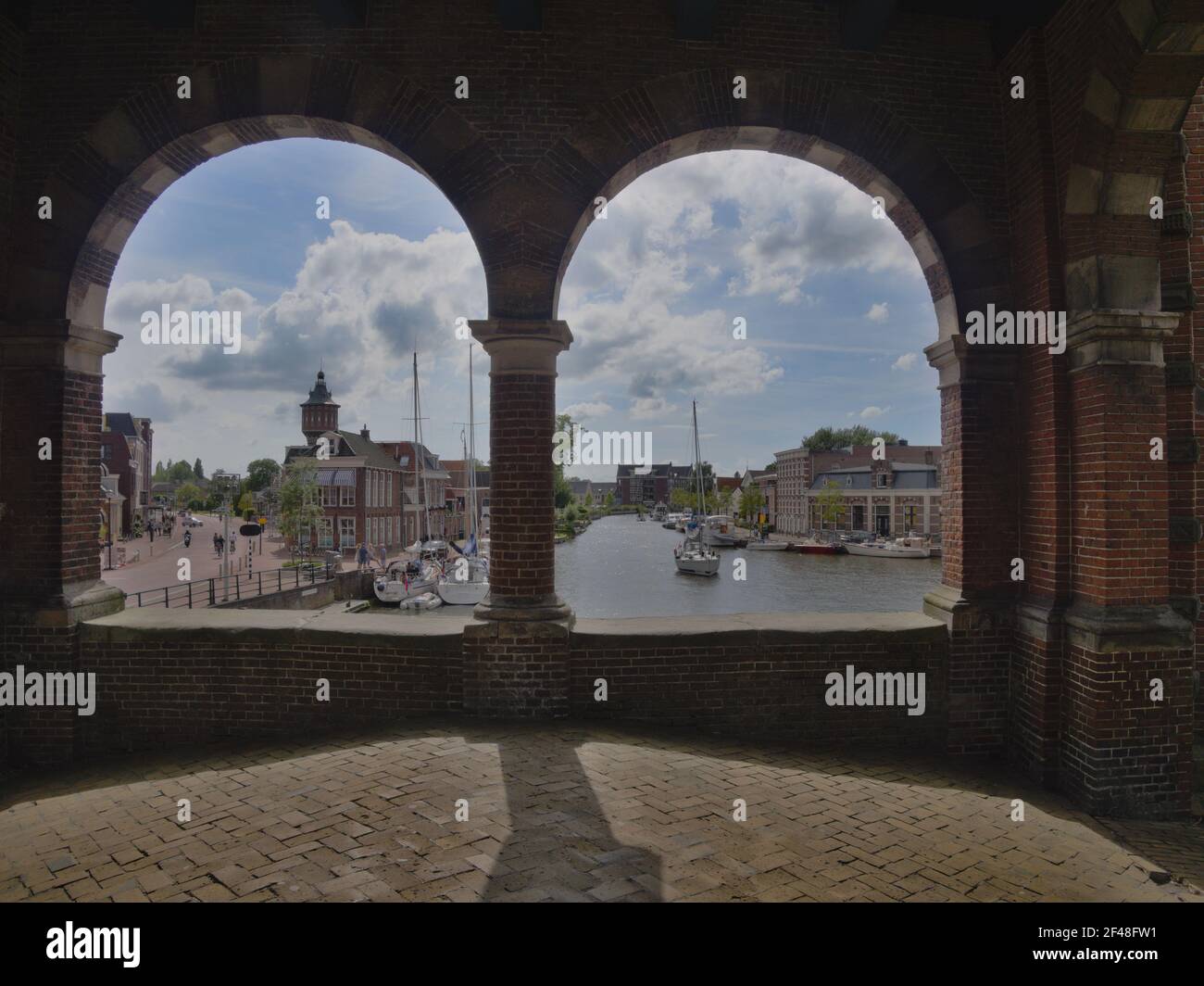 Looking through the two windows of the Waterport of Sneek - Netherlands Stock Photo