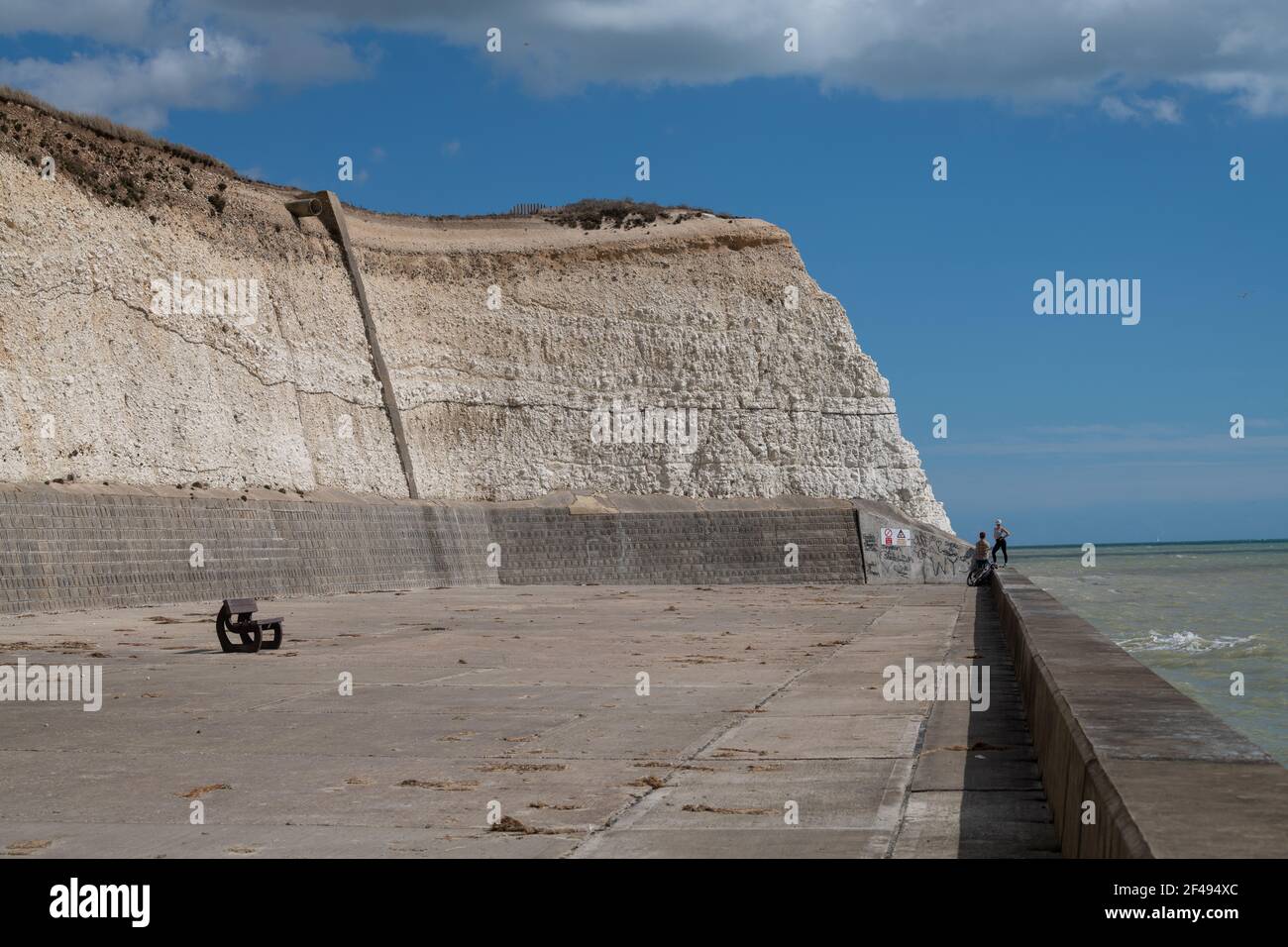 White chalk cliffs, Undercliff Walk and Hills of  South Downs National Park, Saltdean, East Sussex, United Kingdom Stock Photo
