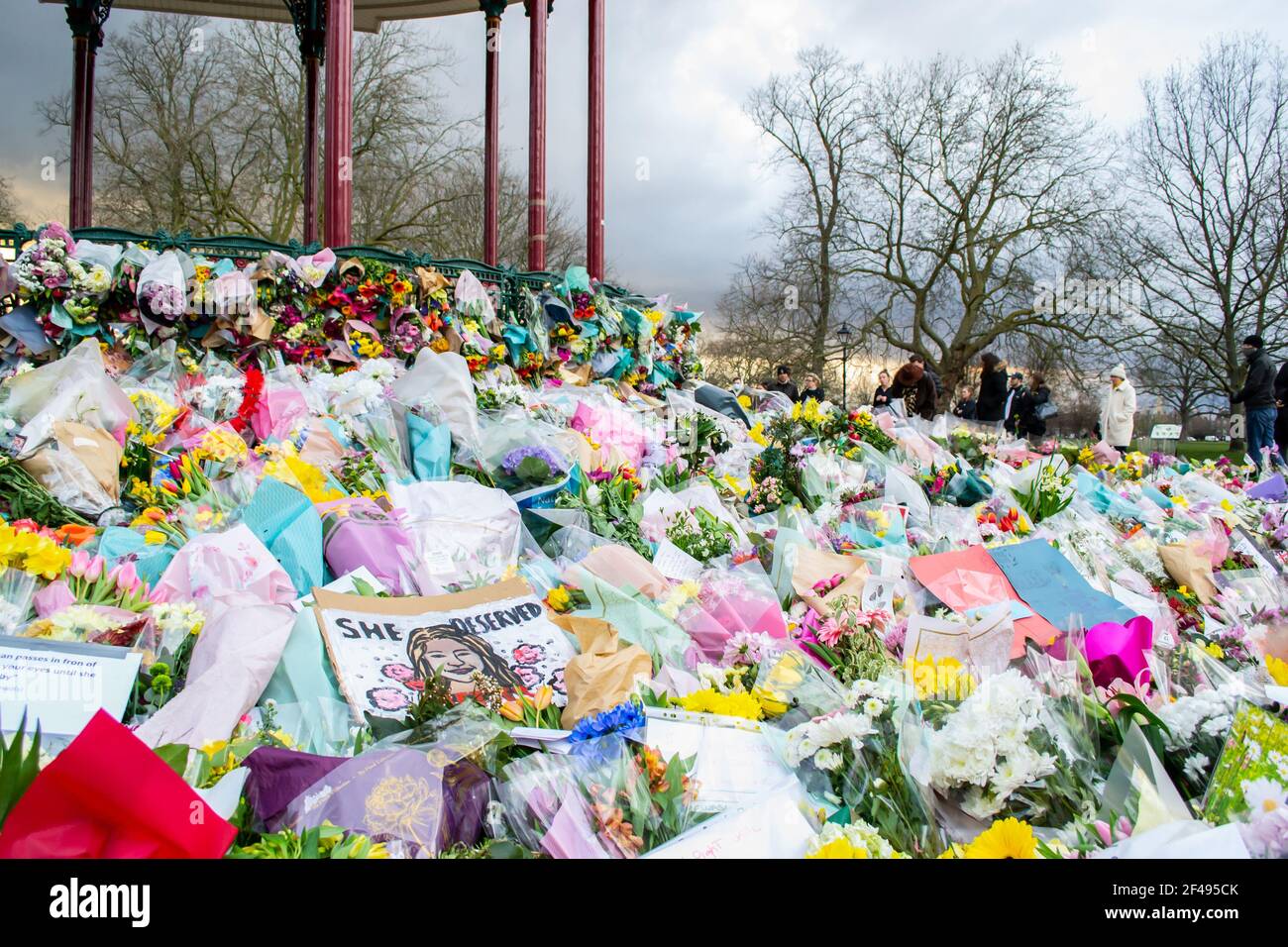 CLAPHAM, LONDON, ENGLAND- 16 March 2021: Flowers and tributes at Clapham Common Bandstand, in memory of Sarah Everard Stock Photo