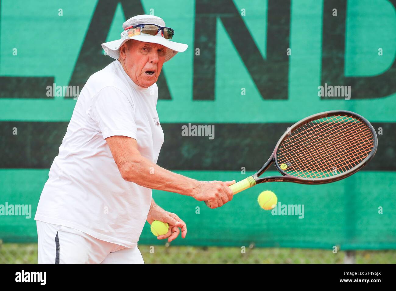Male tennis player in action at the Munich Senior Open 2020, Men's singles  MS80, ITF Seniors Tennis Tournament Stock Photo - Alamy