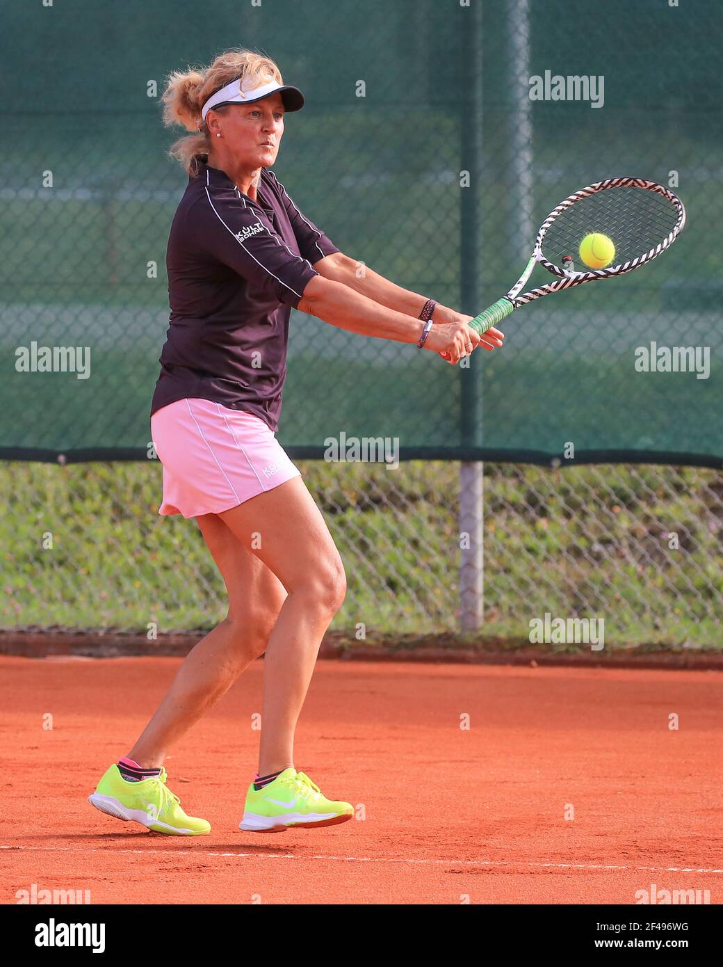 Female tennis player in action at the Munich Senior Open 2020, Women's  singles WS50, ITF Seniors Tennis Tournament Stock Photo - Alamy