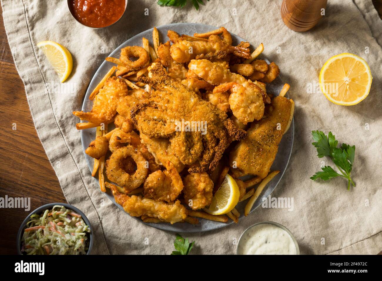 Homemade Deep Fried Seafood Platter with Fries and Tartar Sauce Stock Photo