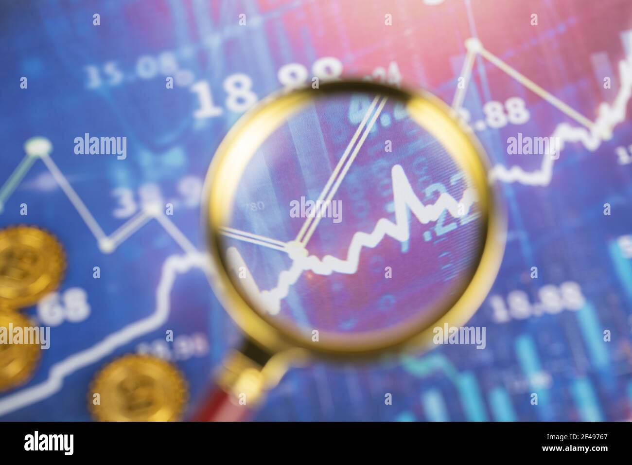 A magnifier on digital stock market chart Stock Photo - Alamy